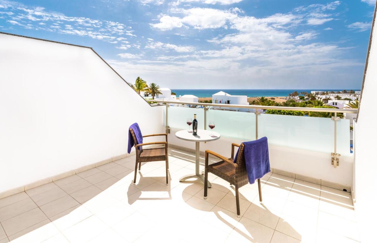 Habitación Doble con vistas al mar (2 adultos + 2 niños) - 2 camas